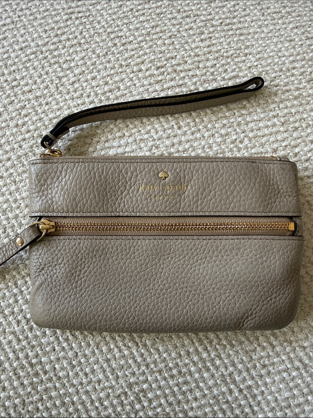kate spade taupe pebbled leather wristlet with gold hardware